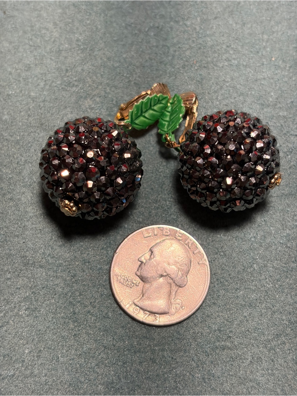 Vintage-Inspired Black Sparkle Berry Clip-Ons with Green Leaf Accents